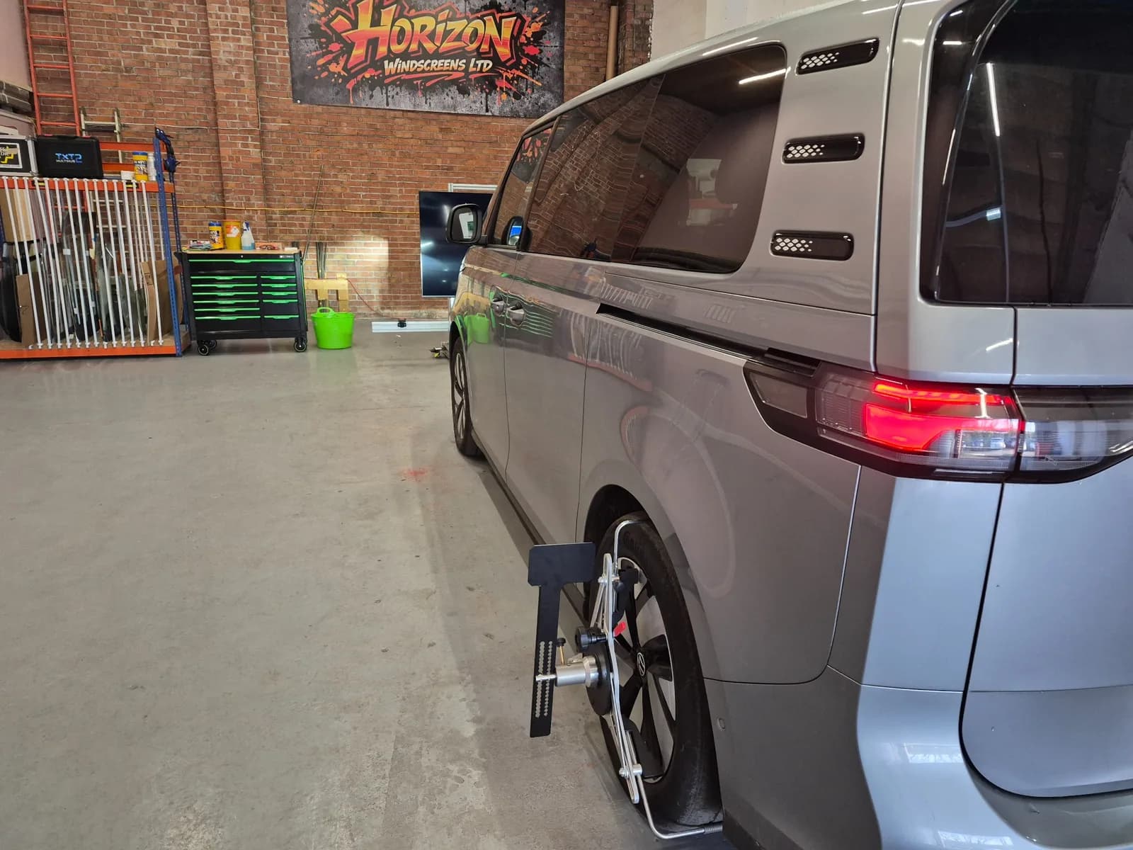Vehicle positioned for static ADAS calibration inside Horizon Windscreens' Cardiff facility.